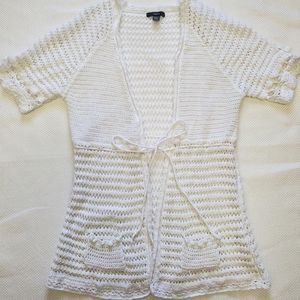 Short sleeve crochet cardigan.